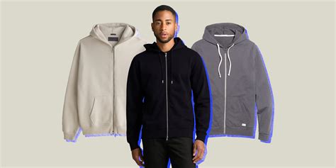 taking off zip up hoodie.